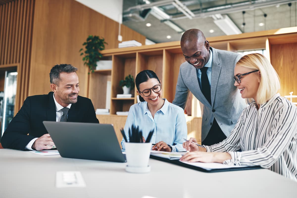 Colleagues reviewing statutory agent service options